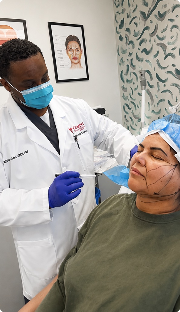 Nurse practitioner mapping thread-lift vectors on a patient's face at Gemini Health & Wellness